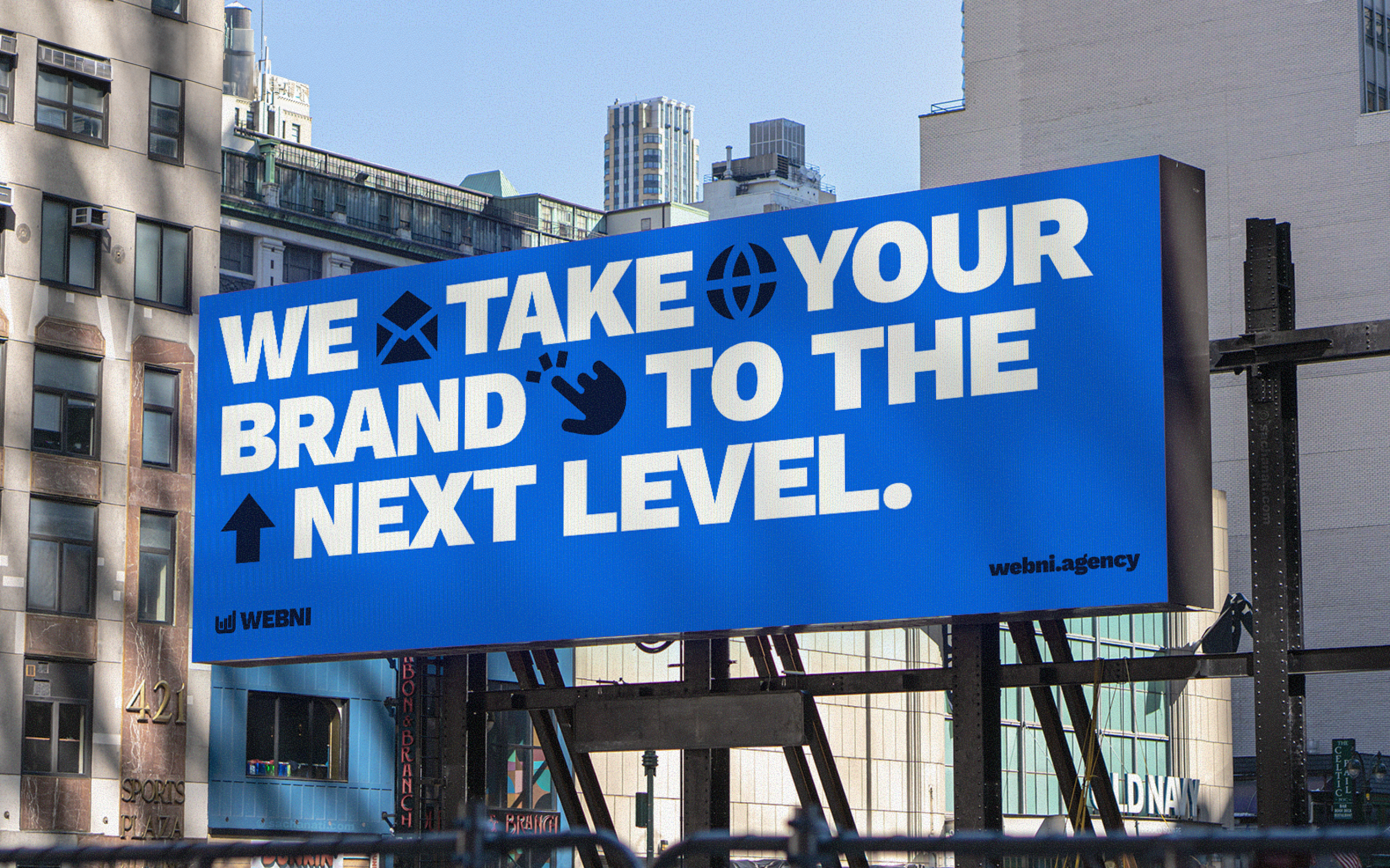 Photo of a study hall with wooden tables and chairs.